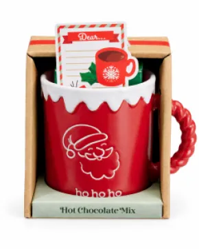 Röd julmugg med varm chokladmix