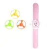 Snäpparmband med snurra (Rosa)