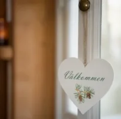 Välkommen skylt hjärta