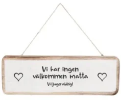 Välkommen skylt- Vi ljuger aldrig